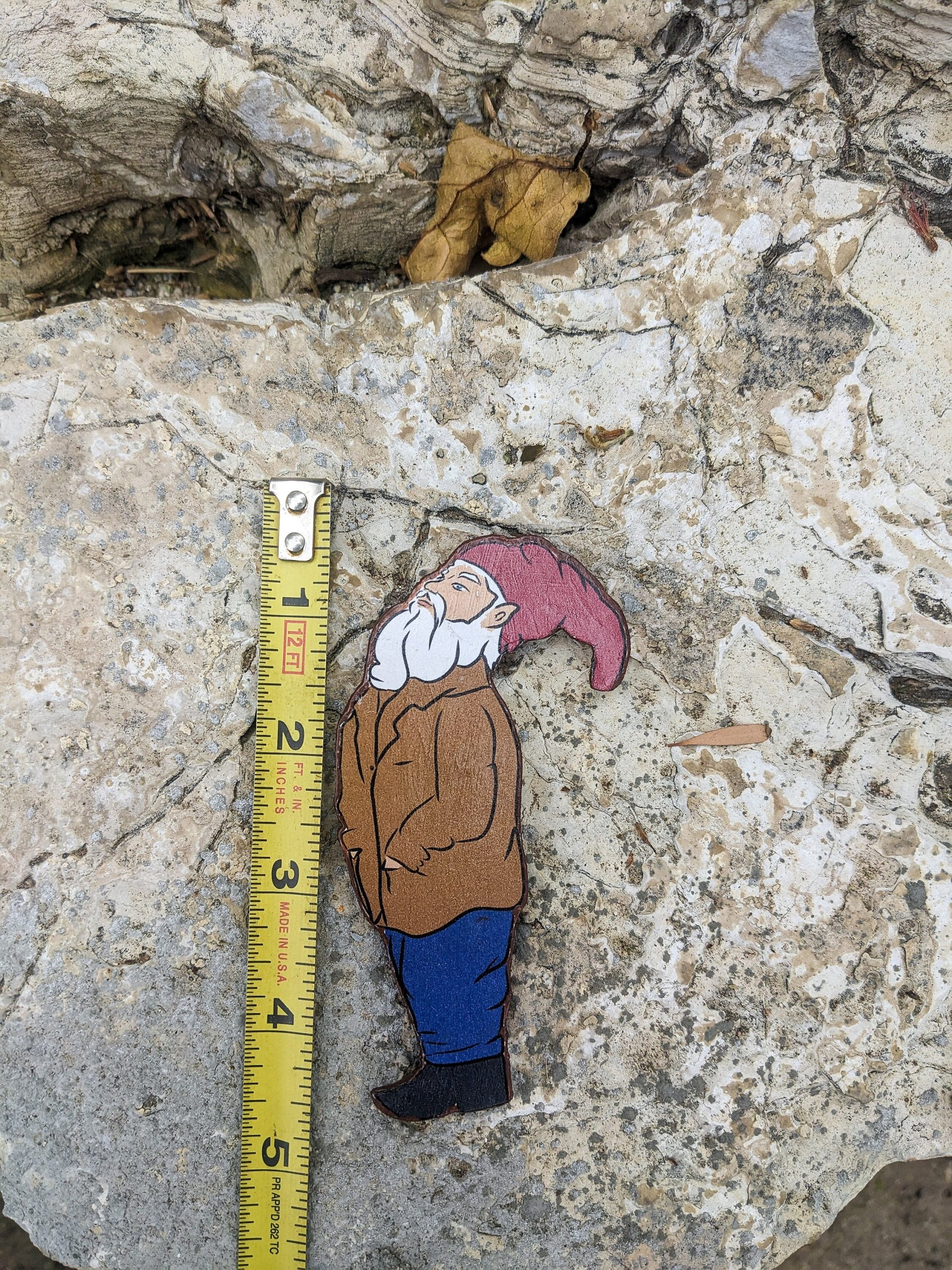 Side profile of wooden gnome magnet cutout — artisan wood home decor from Sprouted Dreams.